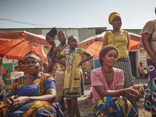 women on the street waiting