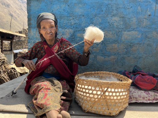 women making rug(radi-pakhi) of sheep wool